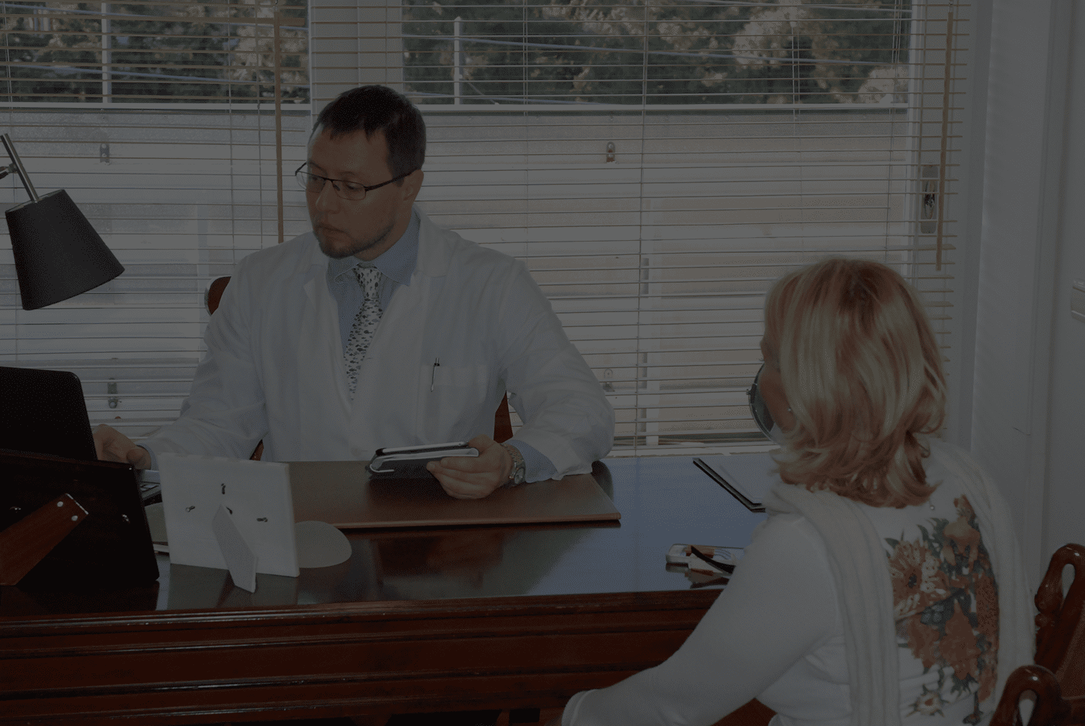 Dr Spiros Vlachos Interviewing Patient